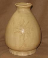 Vase with carved palm